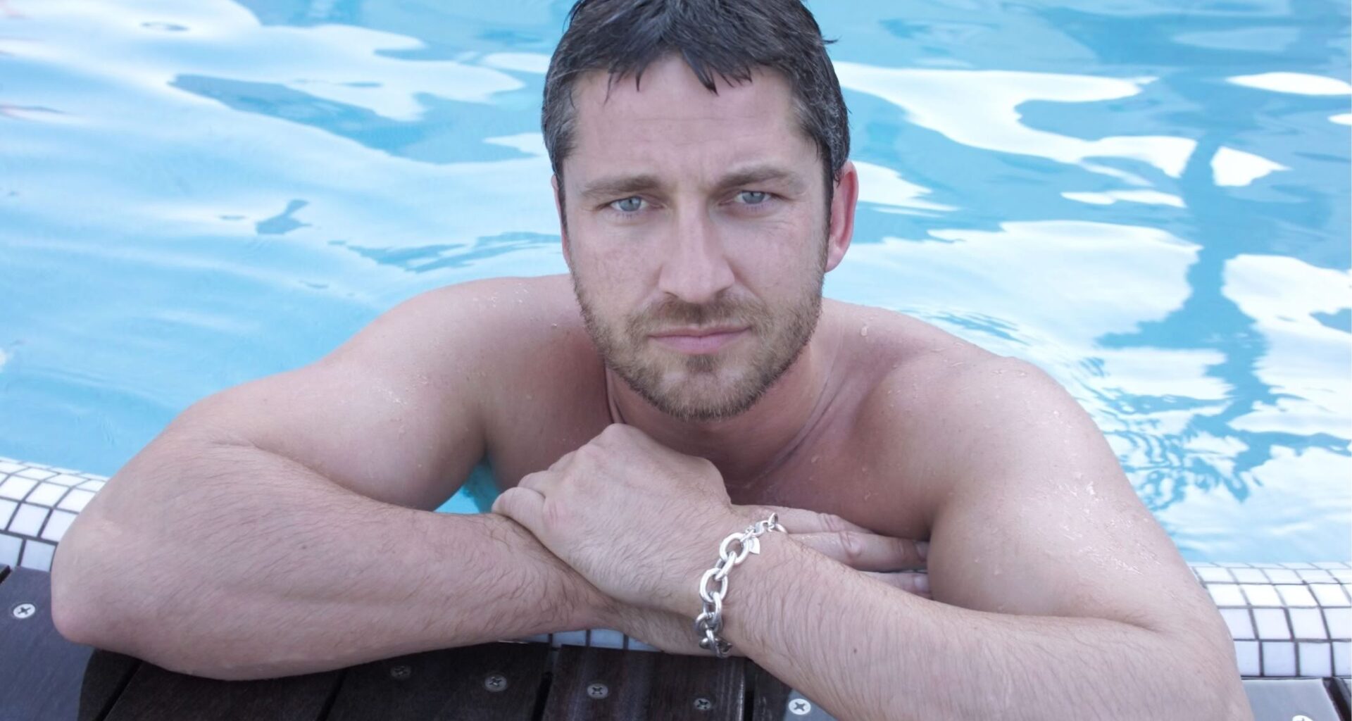 Gerard Butler in the beach